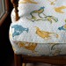 rooster print in golds and blues